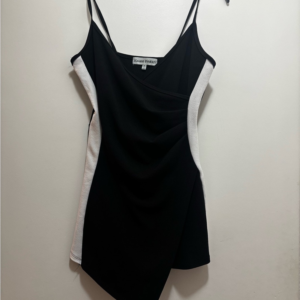 Almost Famous Black & White Asymmetrical Romper